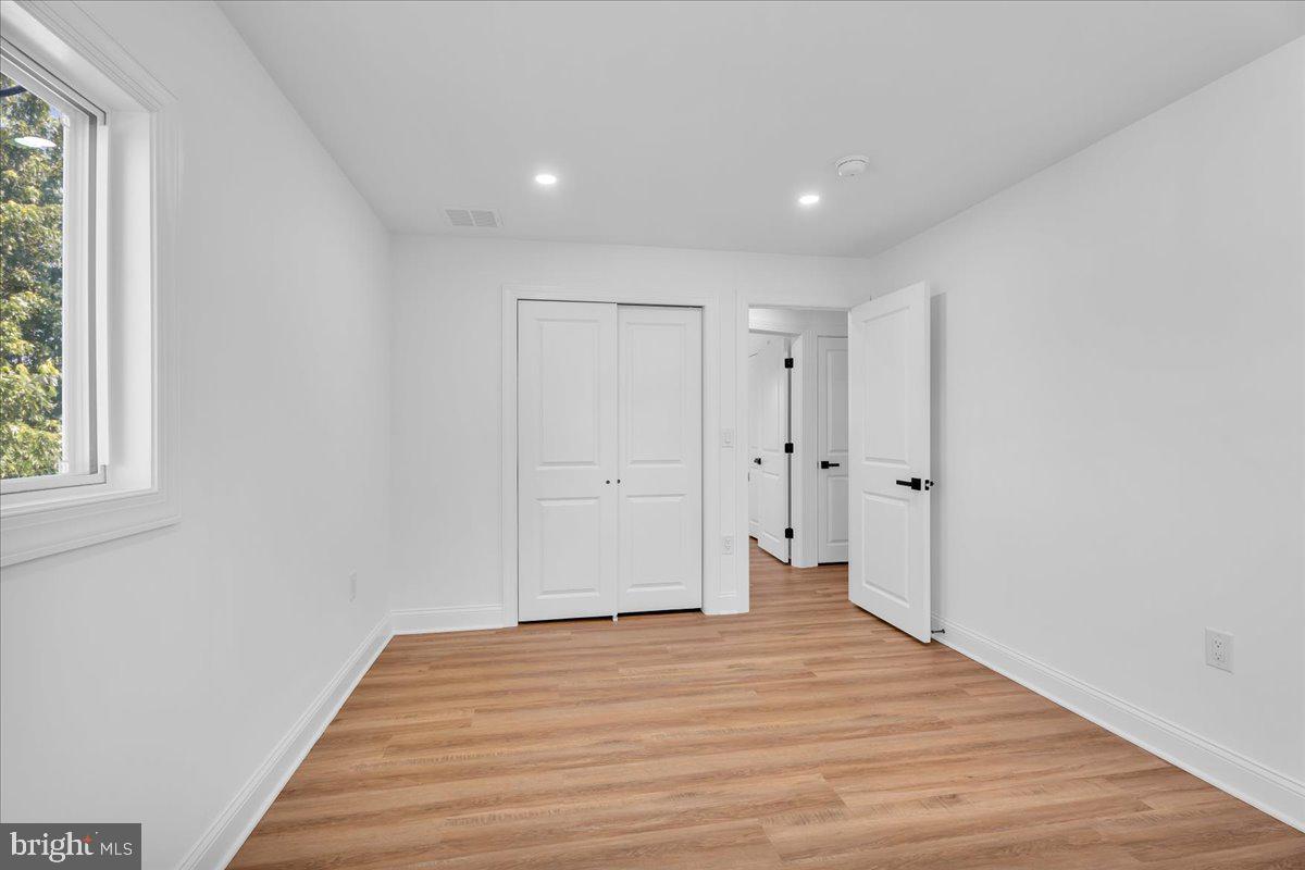 2504 Church Road Cinnaminson, NJ 08077 - Photo 45 of 79 a view of empty room with wooden floor and fan