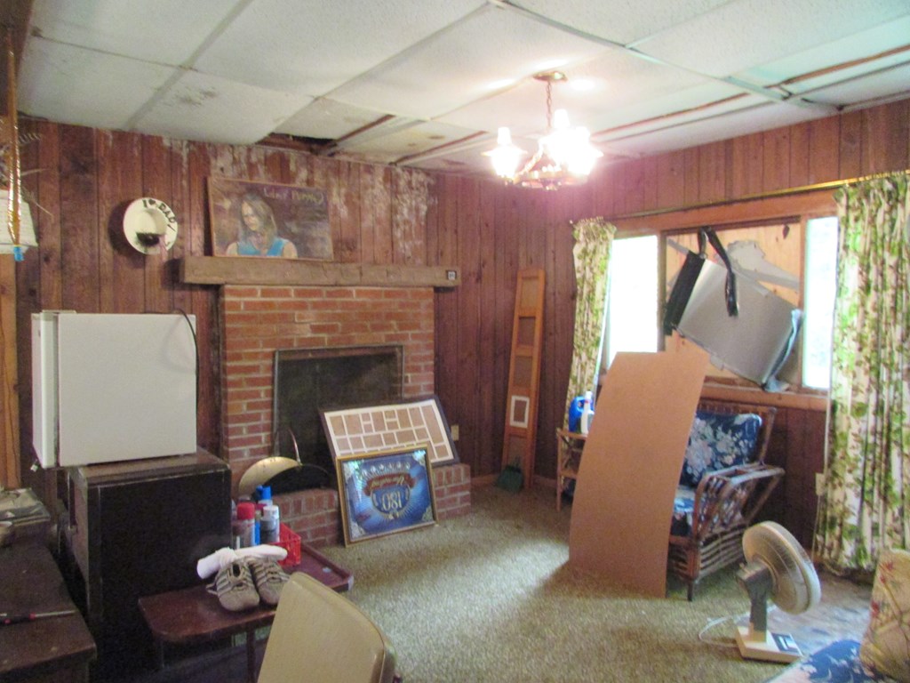 0 Backwoods Lane Leeper, PA 16233 - Photo 3 of 7 a living room with furniture a window and a fireplace