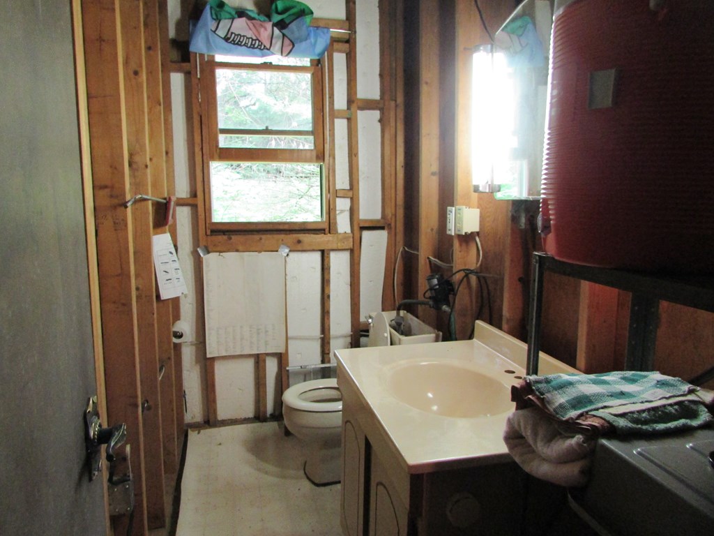 0 Backwoods Lane Leeper, PA 16233 - Photo 7 of 7 a bathroom with a sink toilet and mirror