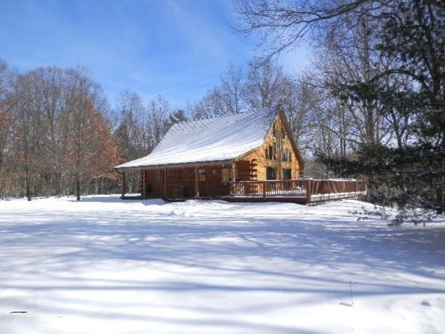 11784 Amber Road Manistee, MI 49660 - Photo 22 of 30 Huge wrap-around white cedar deck