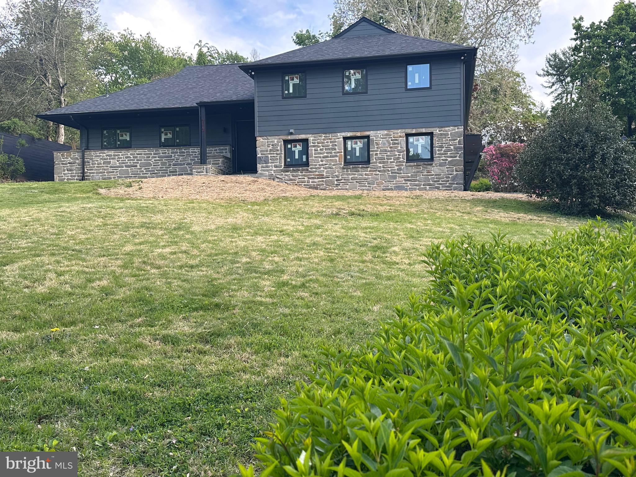 713 Woodfield Road Villanova, PA 19085 - Photo 31 of 36 a front view of a house with a yard