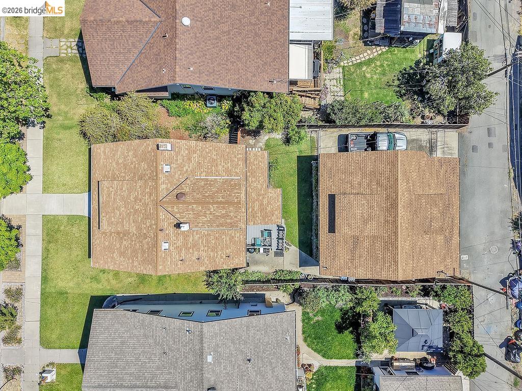 325 South 2nd Street Rio Vista, CA 94571 - Photo 33 of 33 Aerial perspective showcasing a property with a brown shingle roof and a separate structure featuring a similar roof