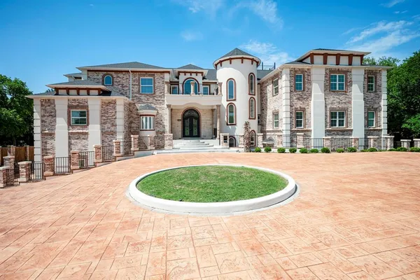a view of a house with outdoor space and swimming pool