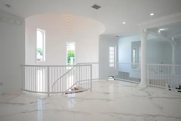 a view of an entryway with a rug