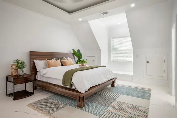 a bathroom with a sink a mirror and shower