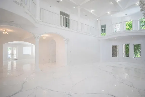 a view of a hallway with entryway