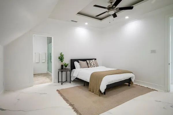 a bathroom with a shower sink and mirror