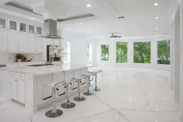 a bathroom with a sink a mirror and a bathtub