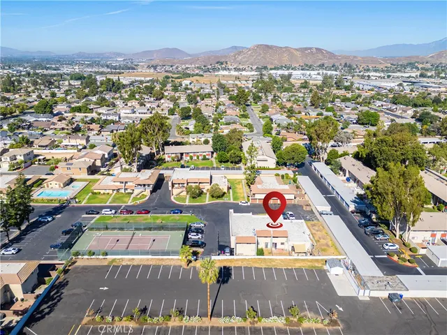 a view of a house with a swimming pool