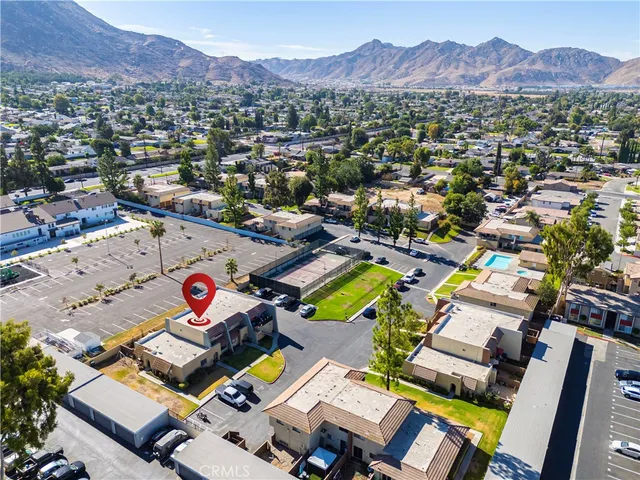 an aerial view of residential houses and outdoor space