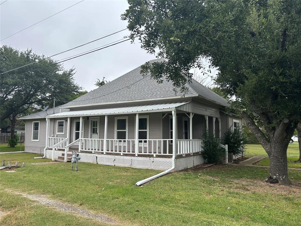 302 North Commerce Savoy, TX 75479 - Photo 32 of 32 front view of a house with a yard