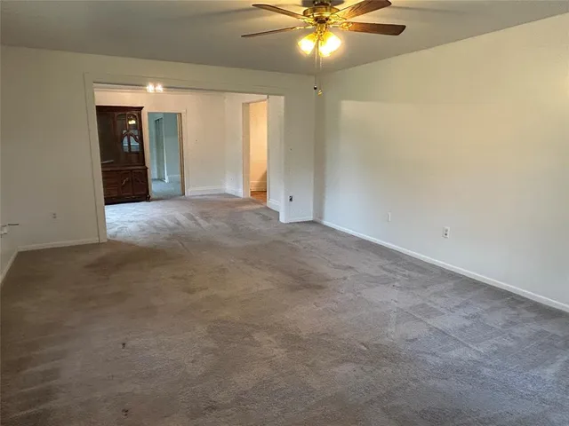 an empty room with a bathroom