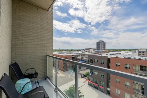 a view of a balcony with city view