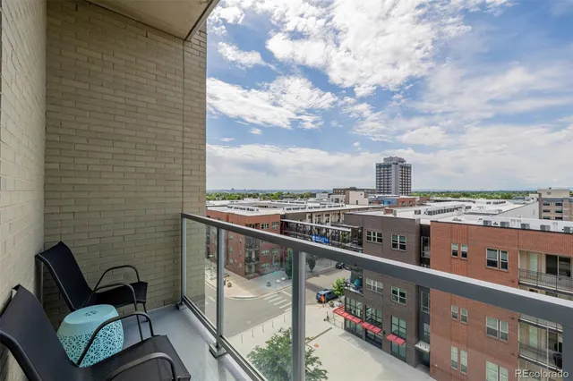 a view of a balcony with city view