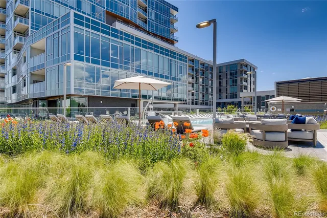 a view of a building with backyard