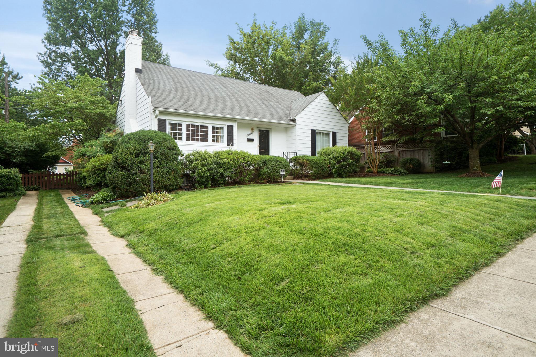 6104 28th Street North Arlington, VA 22207 - Photo 3 of 30 a front view of house with yard and green space