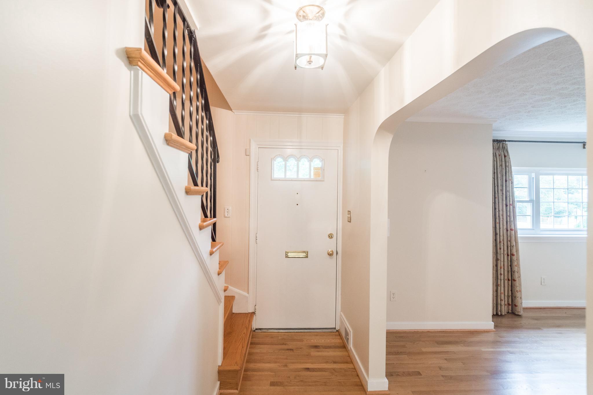 6104 28th Street North Arlington, VA 22207 - Photo 4 of 30 a view of an entryway with wooden floor