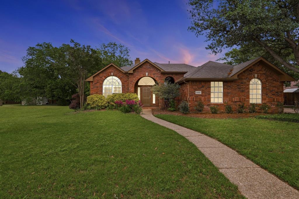 Great curb appeal for this single story on a large corner lot.