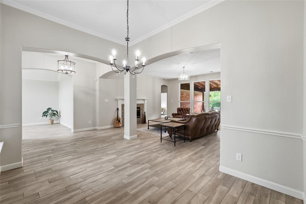2402 Ravinia Drive Corinth, TX 76208 - Photo 11 of 40 From the dining room looking into the living room