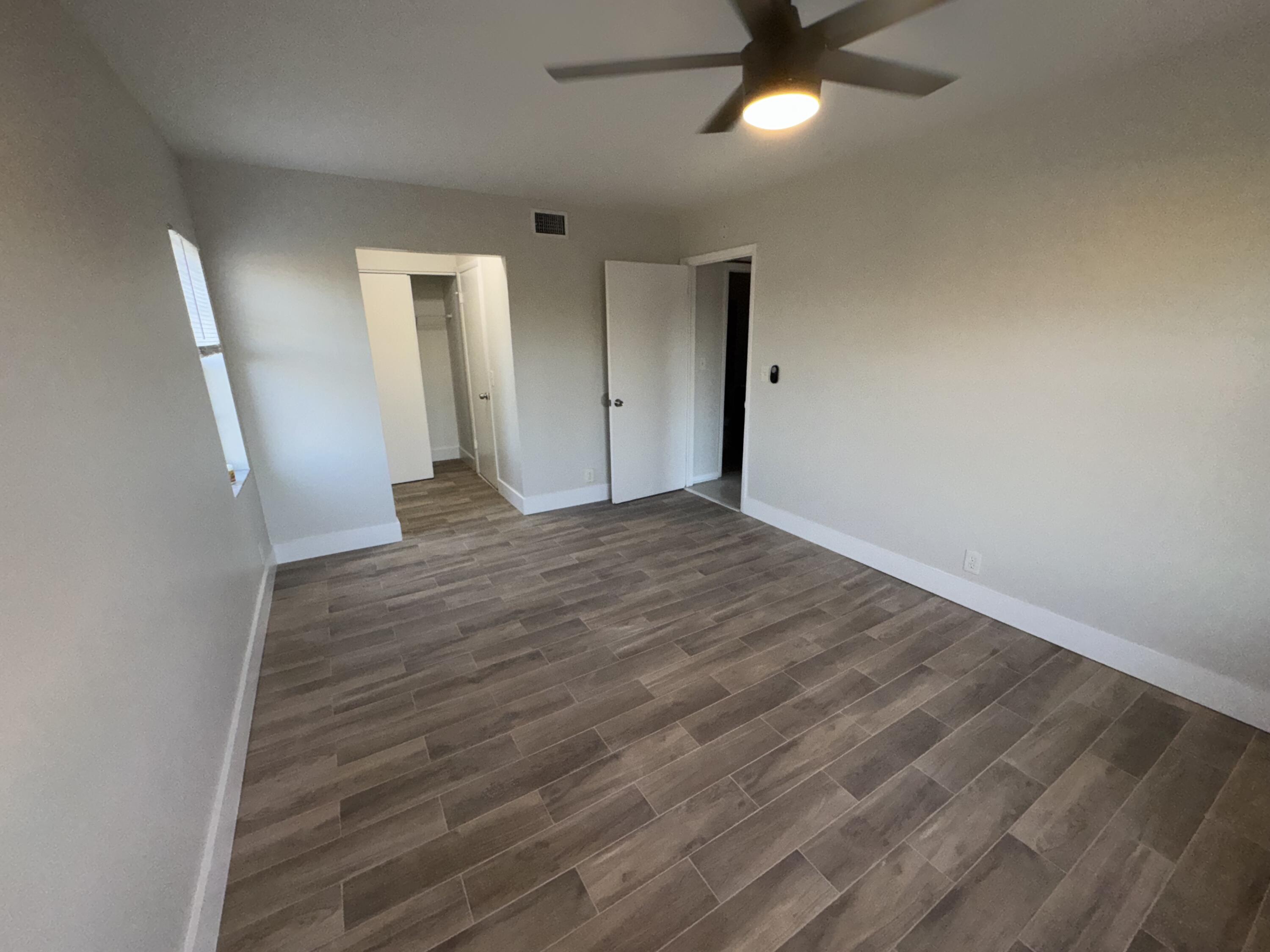 1798 Abbey Road, Unit 207 West Palm Beach, FL 33415 - Photo 6 of 25 Master Bedroom