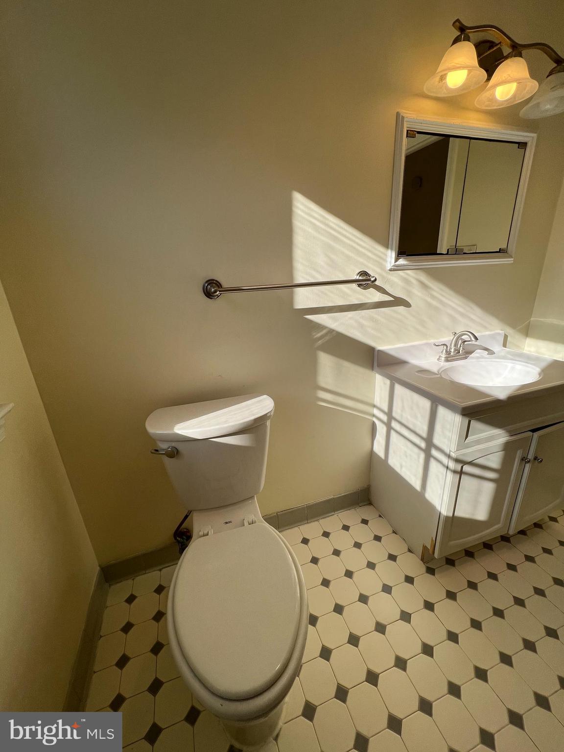 1005 Arcola Avenue Silver Spring, MD 20902 - Photo 23 of 28 a bathroom with a sink toilet and shower