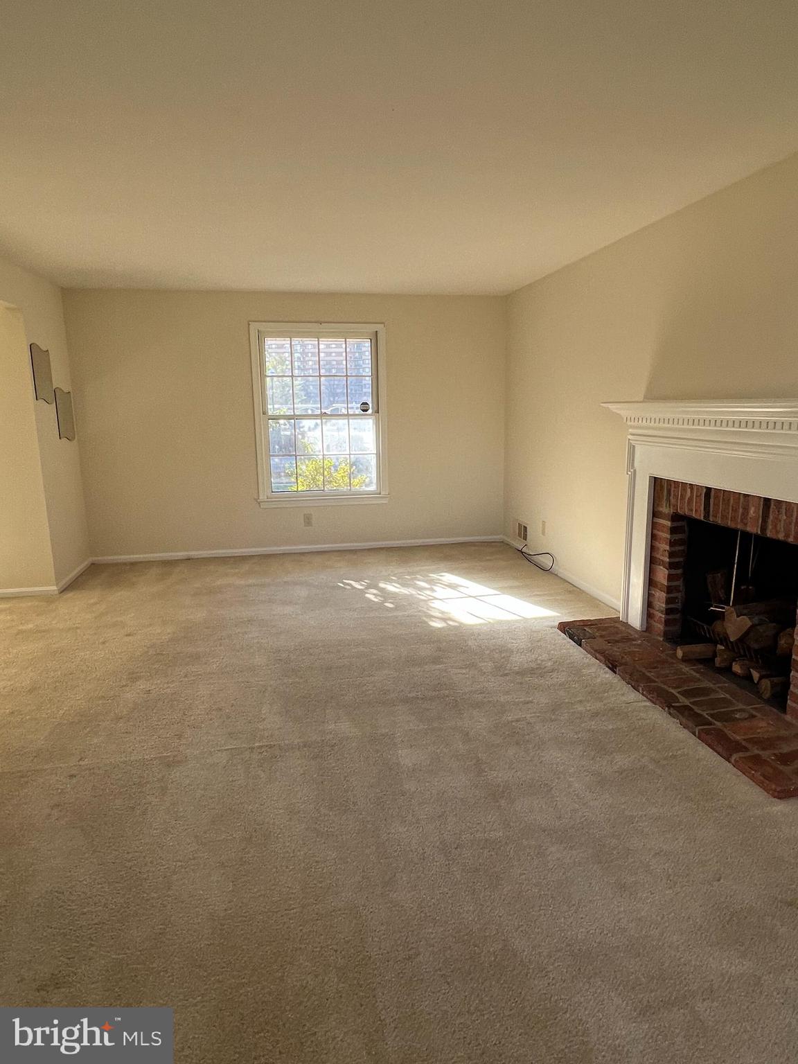 1005 Arcola Avenue Silver Spring, MD 20902 - Photo 5 of 28 a view of empty room with a fireplace