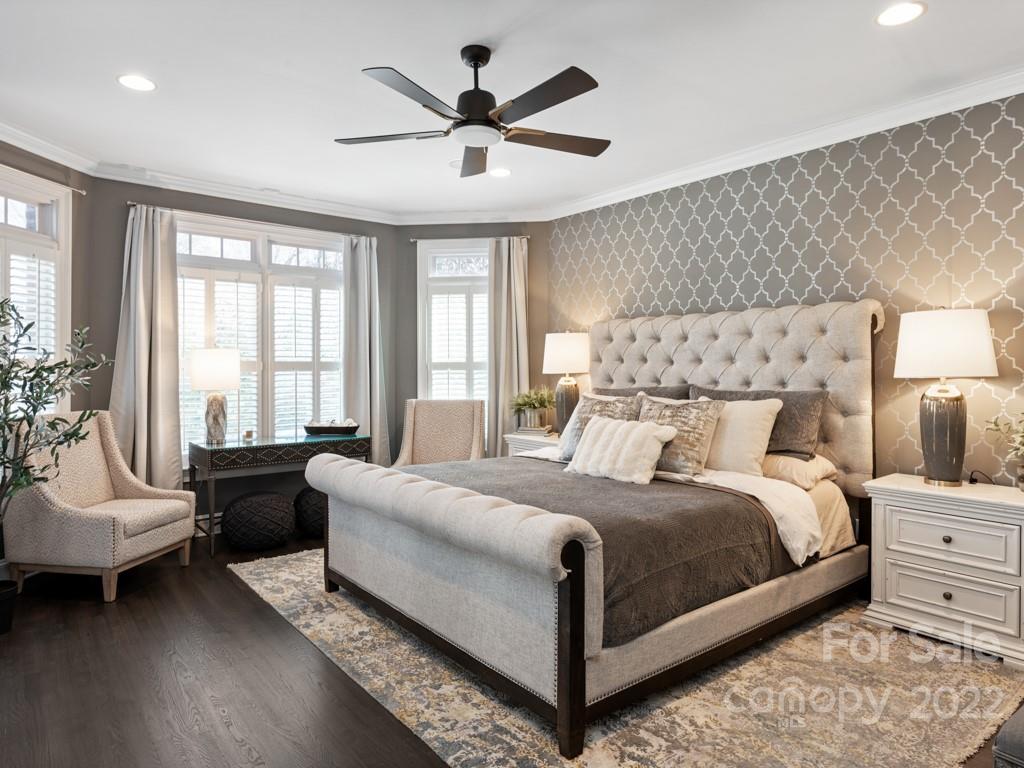 5015 Rea Road Charlotte, NC 28226 - Photo 14 of 48 a bedroom with a large bed couch and a large window