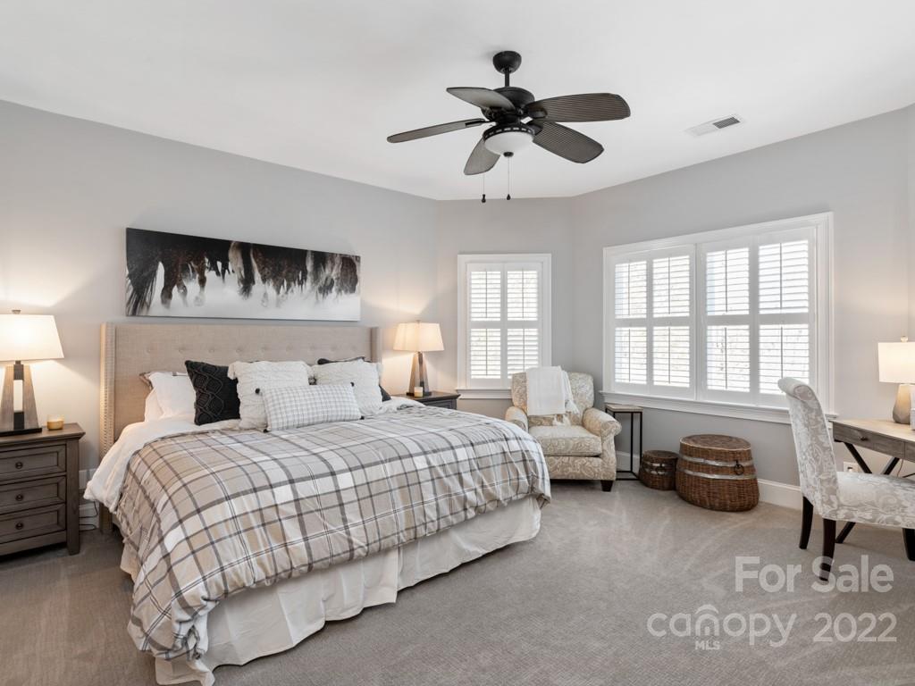 5015 Rea Road Charlotte, NC 28226 - Photo 21 of 48 a bedroom with a bed furniture and a window