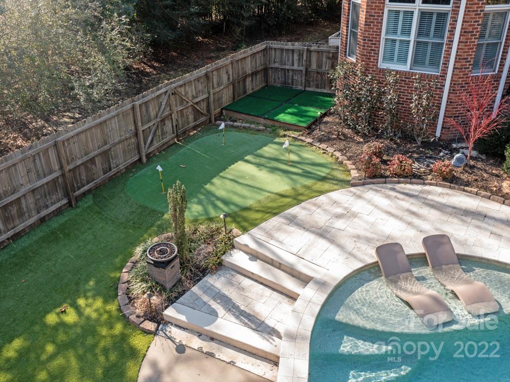 5015 Rea Road Charlotte, NC 28226 - Photo 32 of 48 a view of a backyard with wooden fence