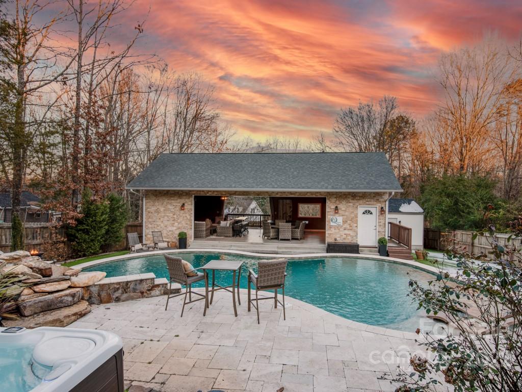 5015 Rea Road Charlotte, NC 28226 - Photo 33 of 48 a view of backyard of house with seating space