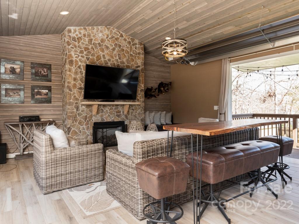 5015 Rea Road Charlotte, NC 28226 - Photo 42 of 48 a living room with fireplace furniture and a flat screen tv