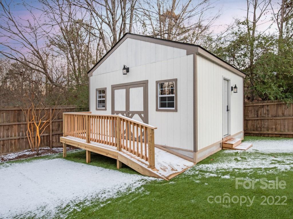 5015 Rea Road Charlotte, NC 28226 - Photo 46 of 48 a view of backyard with a garden and deck
