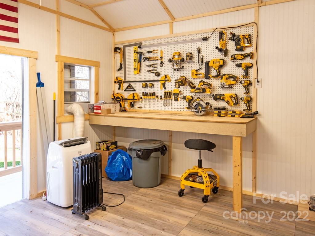 5015 Rea Road Charlotte, NC 28226 - Photo 48 of 48 a car parked in front of a storage