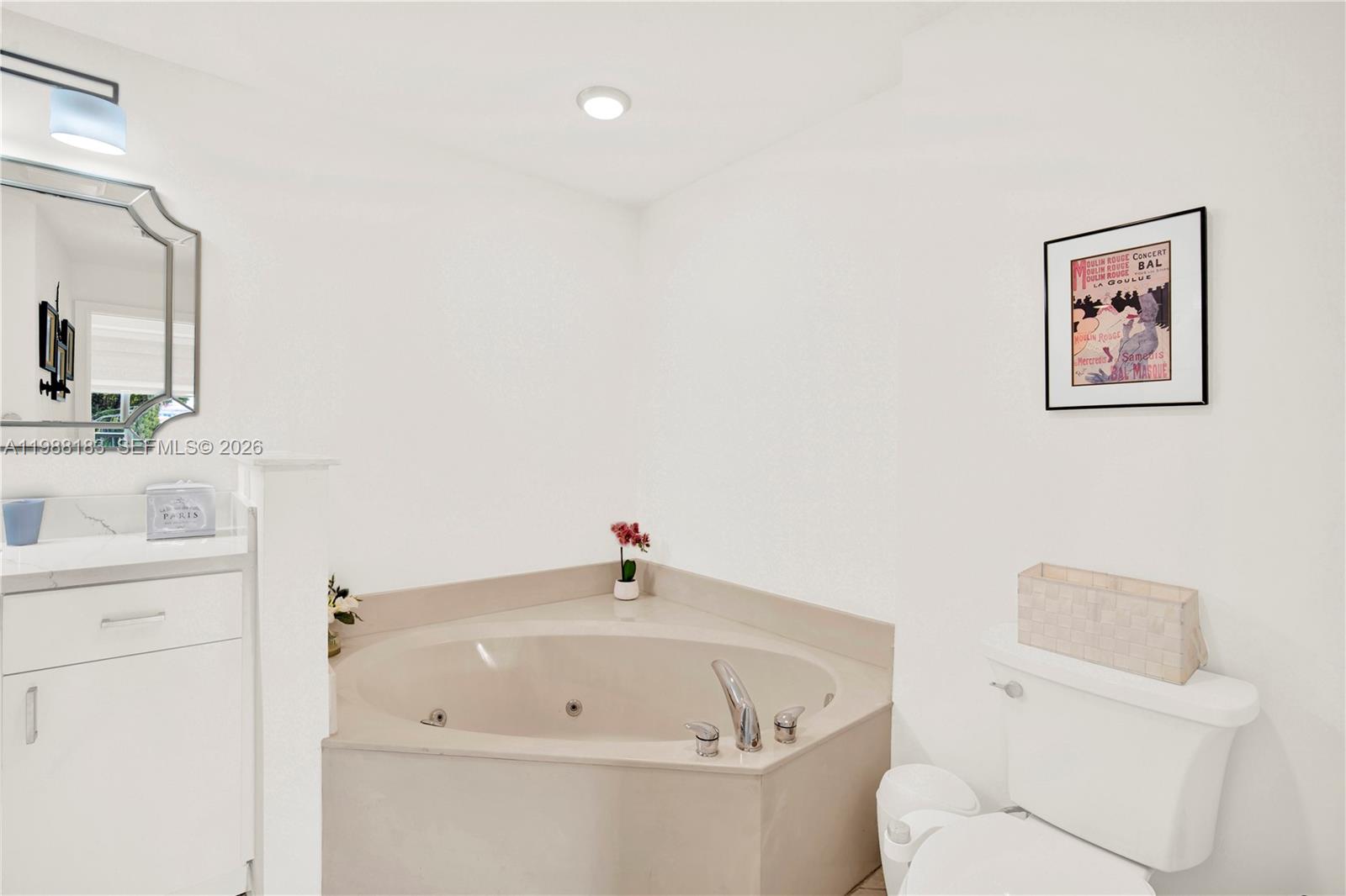 9021 Southwest 94th Street, Unit 308 Miami, FL 33176 - Photo 15 of 35 a white bath tub sitting next to a white toilet