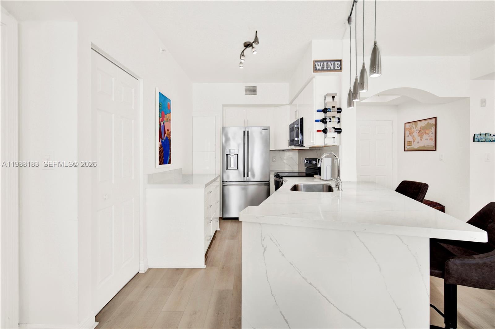 9021 Southwest 94th Street, Unit 308 Miami, FL 33176 - Photo 3 of 35 a very nice looking room with a bed