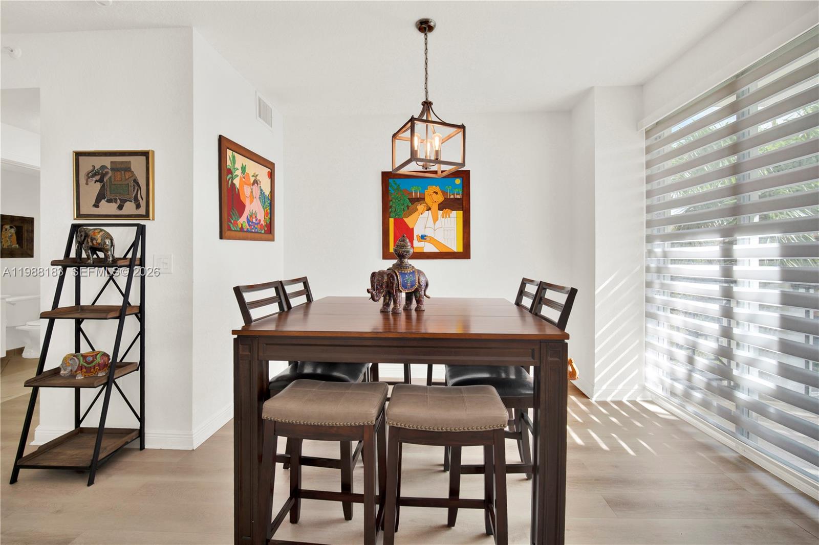 9021 Southwest 94th Street, Unit 308 Miami, FL 33176 - Photo 8 of 35 a dining room with furniture and window