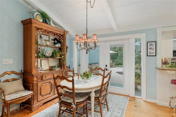 a large kitchen with lots of counter space and stainless steel appliances