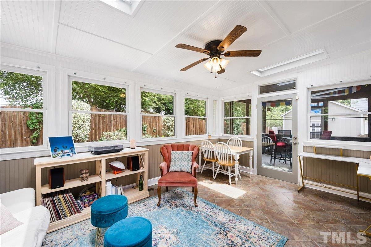 1313 Falls Church Road Raleigh, NC 27609 - Photo 14 of 40 a living room with furniture and a large window