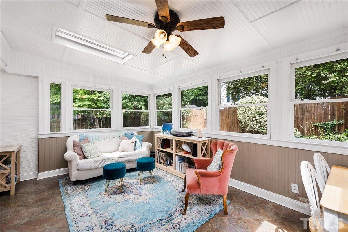 1313 Falls Church Road Raleigh, NC 27609 - Photo 15 of 40 a living room with furniture and a large window