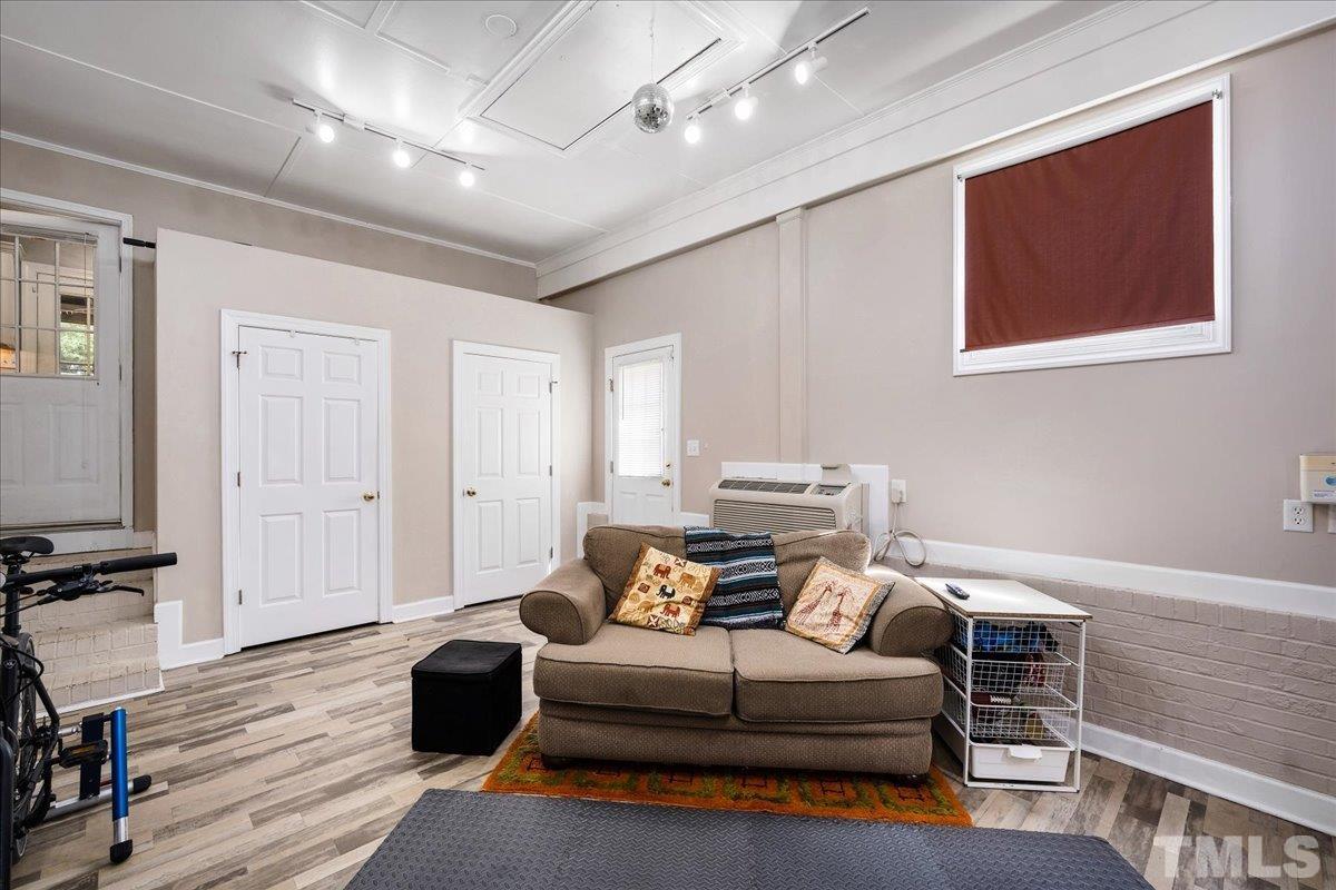 1313 Falls Church Road Raleigh, NC 27609 - Photo 27 of 40 a living room with furniture