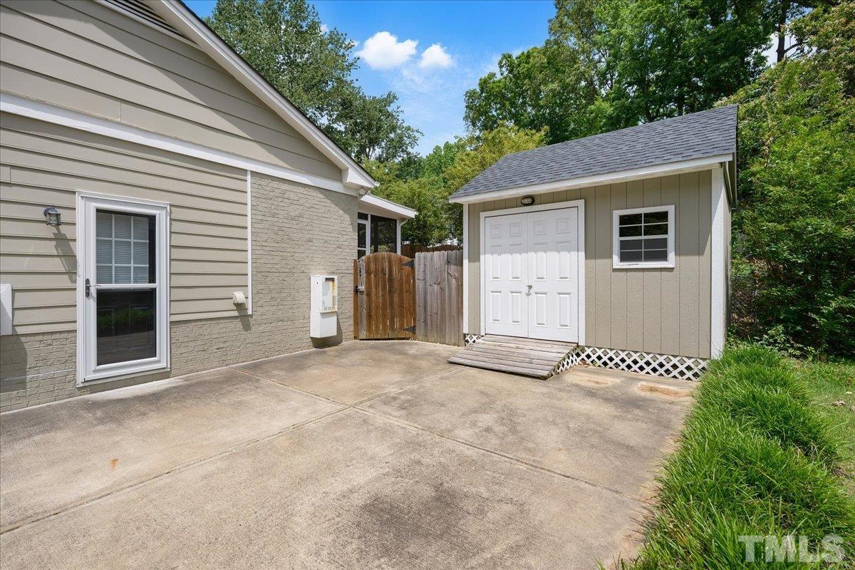 1313 Falls Church Road Raleigh, NC 27609 - Photo 34 of 40 a view of outdoor space and front view of a house