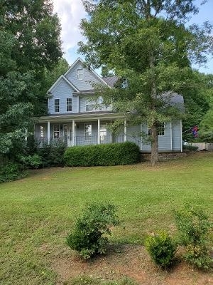 620 Old Elberton Road Athens, GA 30683 - Photo 1 of 1 a front view of a house with a garden