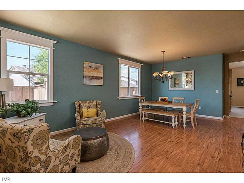 2525 Country Falls Lane Reno, NV 89521 - Photo 12 of 34 a bedroom with furniture and a wooden floor