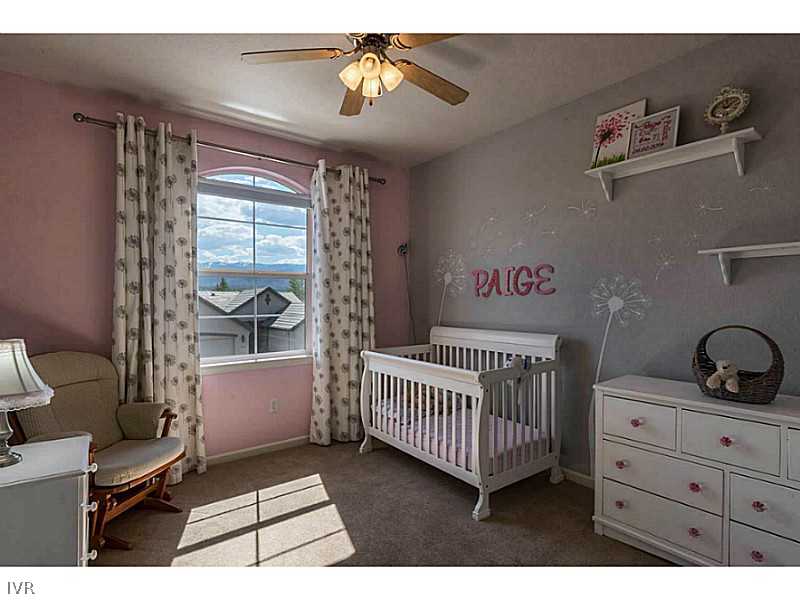 2525 Country Falls Lane Reno, NV 89521 - Photo 21 of 34 a bedroom with furniture and a window