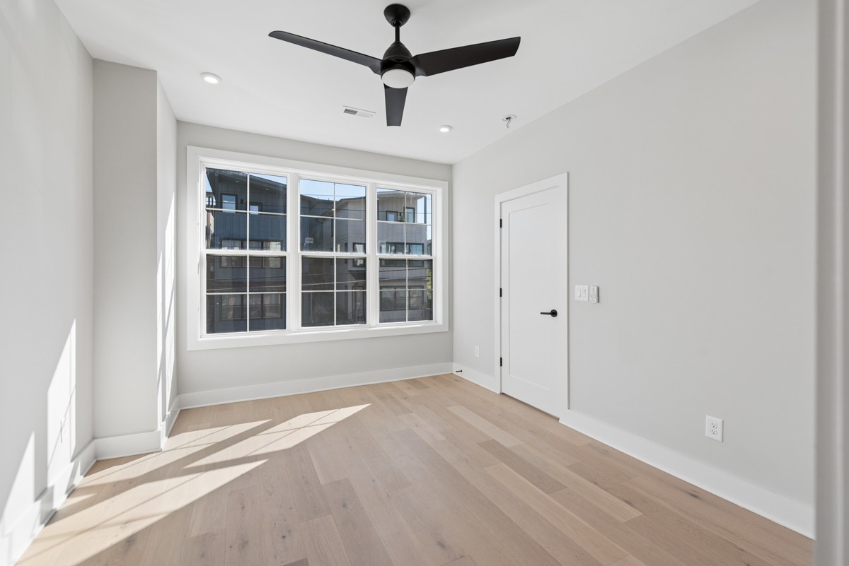 4 D Trimble Street Nashville, TN 37210 - Photo 33 of 53 an empty room with windows and fan