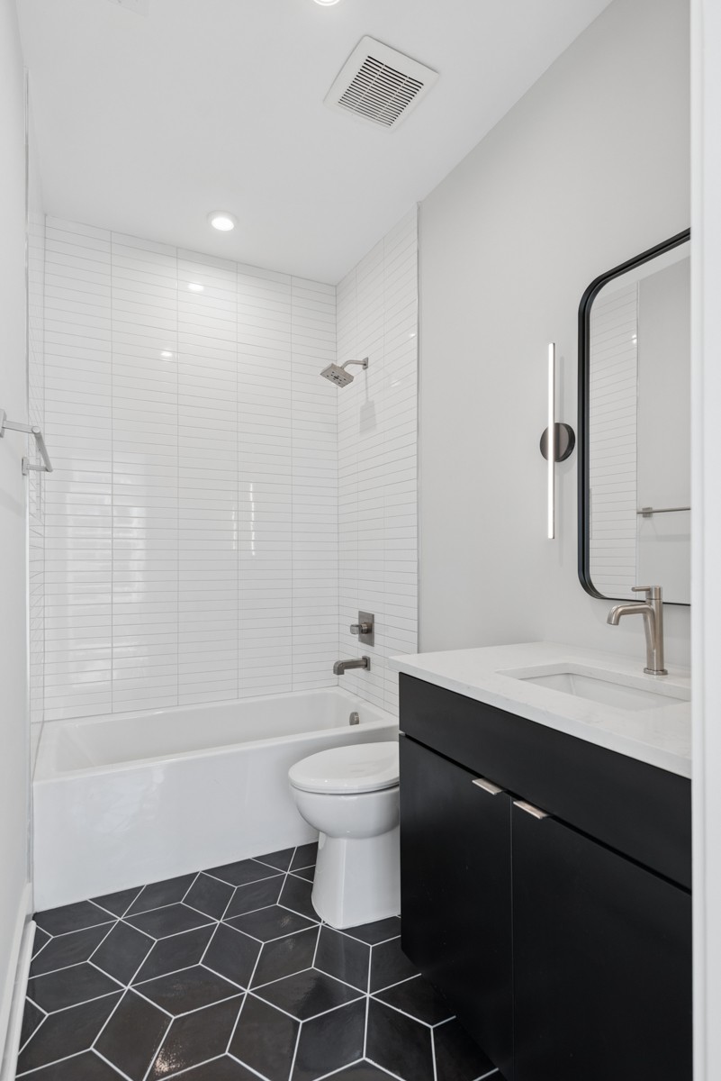 4 D Trimble Street Nashville, TN 37210 - Photo 34 of 53 a bathroom with a sink a toilet and shower