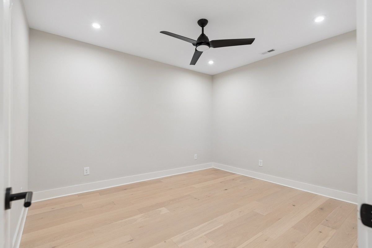 4 D Trimble Street Nashville, TN 37210 - Photo 37 of 53 an empty room with a ceiling fan and window