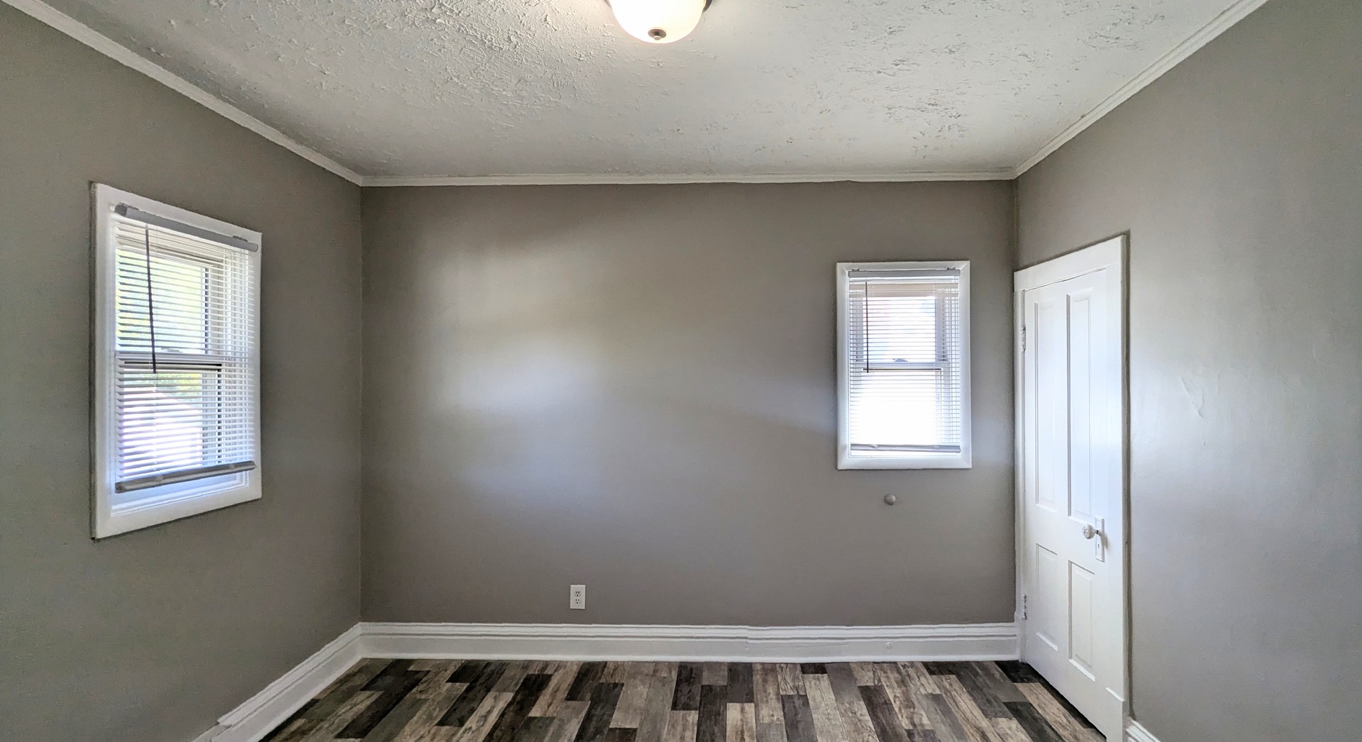 832 Richards Street, Unit 2E Joliet, IL 60433 - Photo 5 of 5 a view of an empty room and window