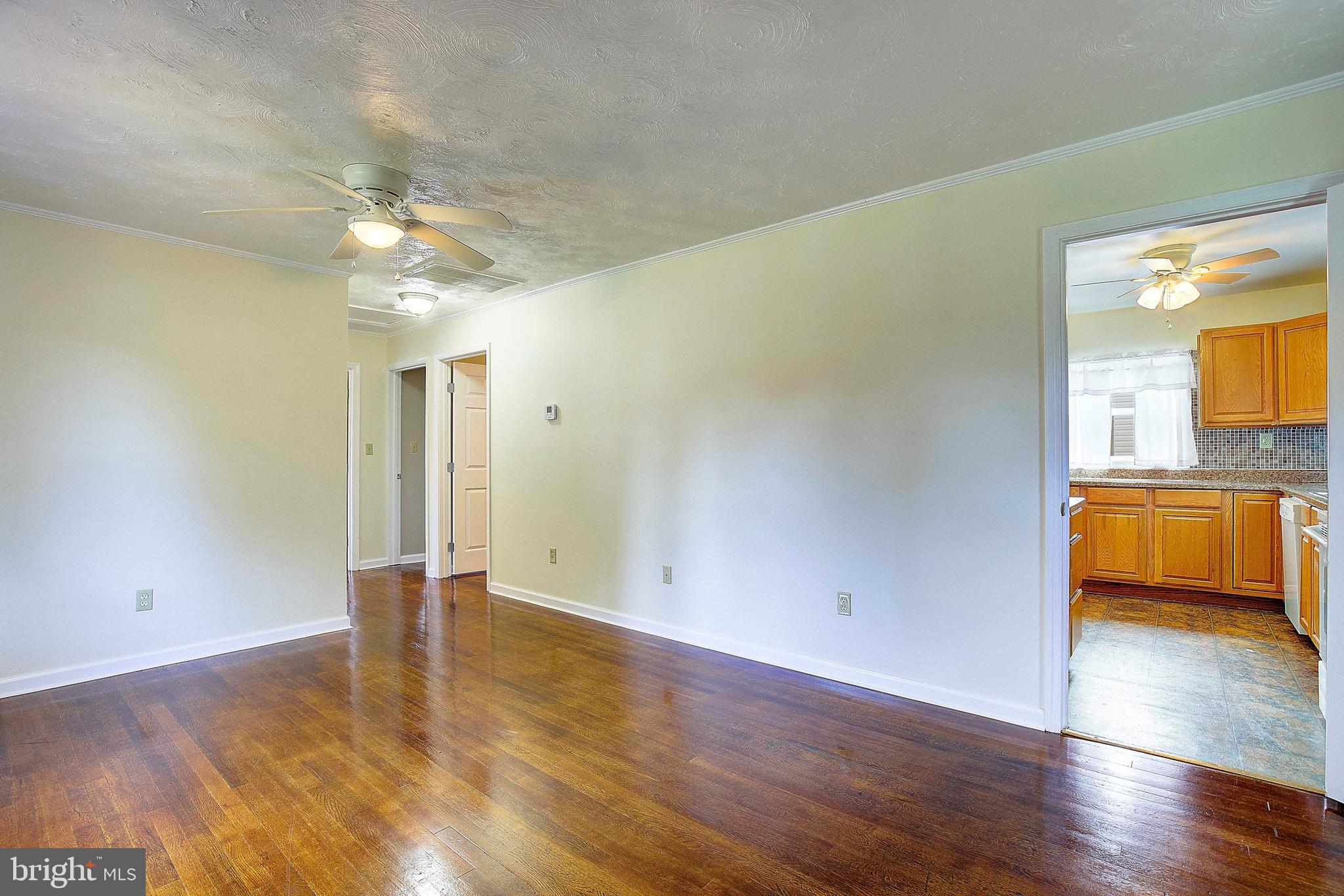 46481 Franklin Road Lexington Park, MD 20653 - Photo 5 of 31 Living Room to the kitchen
