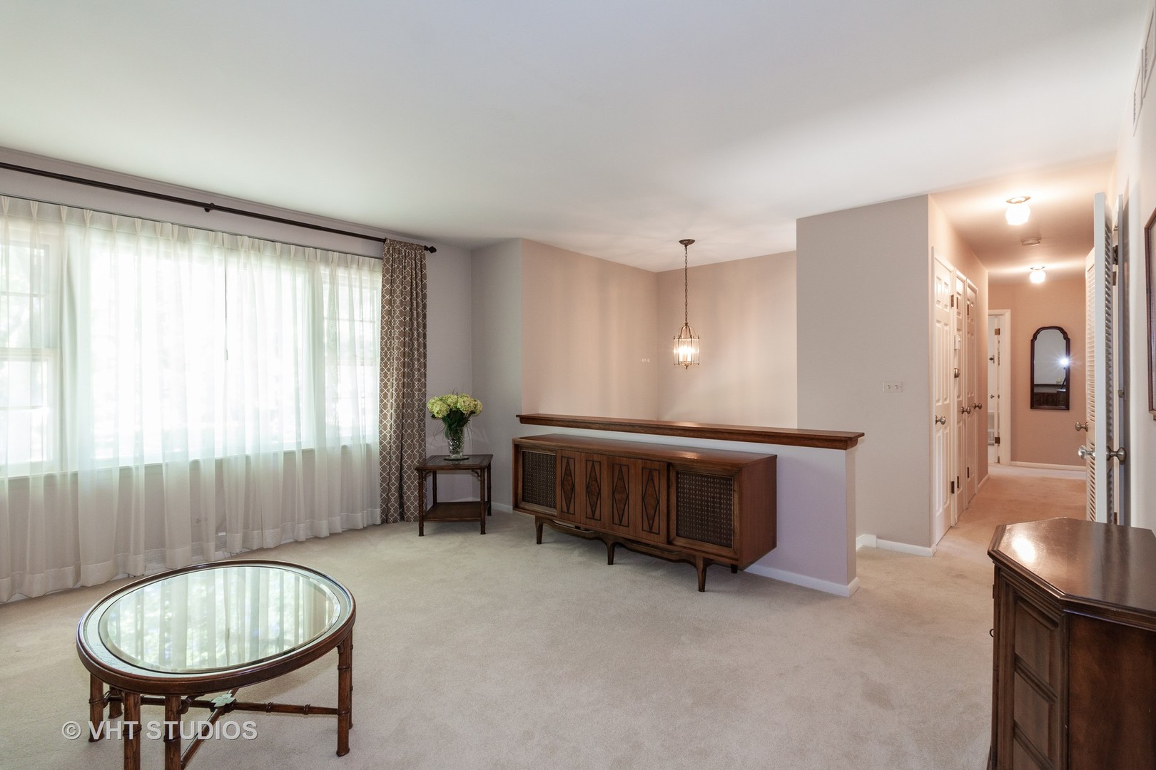 N255 Peter Road Winfield, IL 60190 - Photo 3 of 29 a room with furniture and a chandelier